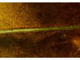 An Endurance 4 watt infrared diode-pumped solid-state (DPSS) laser metal marking head